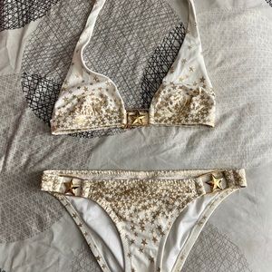 Victoria’s Secret swimsuit, gold stars